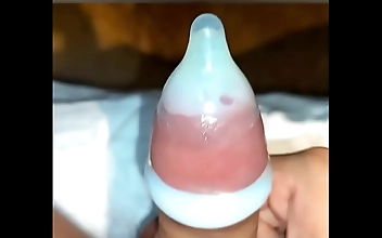 Watch JAV Enchantress Squeeze into Tiny Panties While Dry-Humping with 2 Small Condoms